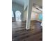 Open living area with natural lighting and wood flooring at 8616 Willow Cabin St, Las Vegas, NV 89131