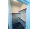 Nicely designed walk-in closet with shelf storage and wood-look floors at 8616 Willow Cabin St, Las Vegas, NV 89131