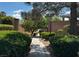 Charming walkway lined with manicured landscaping, providing a serene environment for residents at 8616 Willow Cabin St, Las Vegas, NV 89131