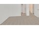 Spacious bedroom featuring neutral carpet and adjacent bathroom at 8852 Flora Run Ave, Las Vegas, NV 89166
