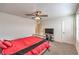 Well-lit bedroom featuring a comfortable bed, neutral carpet, and a modern ceiling fan at 9114 Riverlands Ranch St, Las Vegas, NV 89139