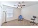 Neutral bedroom featuring plush carpet and a ceiling fan, perfect for a relaxing retreat at 9114 Riverlands Ranch St, Las Vegas, NV 89139