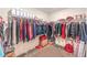 Large walk-in closet with ample storage, organized shelves, and hanging rods at 9114 Riverlands Ranch St, Las Vegas, NV 89139