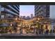 Outdoor courtyard with a vibrant social scene and dining areas at 924 S First St # 306C, Las Vegas, NV 89101