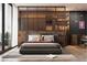 Modern bedroom with glass enclosed closet and hardwood floors at 924 S First St # 306C, Las Vegas, NV 89101
