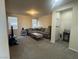 Comfortable living room with plush couch, area rug and natural light at 933 Kimbark Ave, Las Vegas, NV 89148