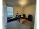 Comfortable office with carpet flooring, a window, and a desk area at 933 Kimbark Ave, Las Vegas, NV 89148