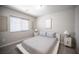Bedroom with a window, carpet and stylish decor on the walls at 9807 Panther Hollow St, Las Vegas, NV 89141