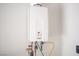 This home has a Rinnai tankless water heater with digital controls for adjusting the water temperature at 9807 Panther Hollow St, Las Vegas, NV 89141