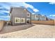 Backyard showing ample space, neutral landscape and an exterior elevation view at 1027 Gentle Swan St # 689, Henderson, NV 89011