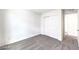 Cozy bedroom featuring soft carpet, a sliding-door closet, and ample natural light at 1027 Gentle Swan St # 689, Henderson, NV 89011