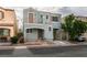 Charming two-story house with a balcony, driveway, and well-maintained landscaping at 10373 Perfect Parsley St, Las Vegas, NV 89183