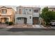 Charming two-story home with a front porch, balcony, and a well-maintained front yard at 10373 Perfect Parsley St, Las Vegas, NV 89183
