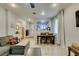 Spacious living room and dining area with great lighting, creating a warm and inviting atmosphere at 10373 Perfect Parsley St, Las Vegas, NV 89183