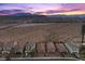 Aerial view of a suburban neighborhood with mountain views and desert landscape at 10431 Seelos St, Las Vegas, NV 89178
