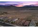 An aerial view of single Gathering homes with desert landscape at 10431 Seelos St, Las Vegas, NV 89178