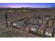 Expansive aerial view of community, mountains, desert landscape, and recreation area with ballfields at 10431 Seelos St, Las Vegas, NV 89178