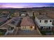 Aerial view of a home's private backyard with patio furniture on a paved area and a small fenced yard at 10431 Seelos St, Las Vegas, NV 89178