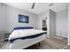 Inviting bedroom features neutral tones, a ceiling fan, and contemporary decor at 10431 Seelos St, Las Vegas, NV 89178