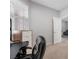 Office featuring a black computer desk, wooden cabinet, and natural light from the window at 10431 Seelos St, Las Vegas, NV 89178