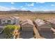Home with desert landscaping, paved driveway, and two-car garage at 10431 Seelos St, Las Vegas, NV 89178