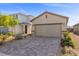 Beautiful two-story home featuring a large two-car garage and desert landscaping at 10431 Seelos St, Las Vegas, NV 89178