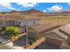 Features desert landscaping, paved driveway, and two-car garage at 10431 Seelos St, Las Vegas, NV 89178