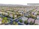 Aerial view of a residential neighborhood showing tree-lined streets and well-maintained homes at 10902 Pentland Downs St, Las Vegas, NV 89141