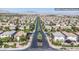 Aerial view of the neighborhood with manicured lawns and tree-lined streets at 10902 Pentland Downs St, Las Vegas, NV 89141
