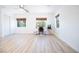 Spacious bedroom with two windows, ceiling fan, and sliding closet doors at 10902 Pentland Downs St, Las Vegas, NV 89141