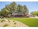 Entrance sign for Royal Highlands featuring manicured lawns and mature trees at 10902 Pentland Downs St, Las Vegas, NV 89141