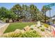 Welcoming community entrance with manicured landscaping and signage at 10902 Pentland Downs St, Las Vegas, NV 89141