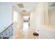 Bright hallway with light wood floors and access to multiple rooms at 10902 Pentland Downs St, Las Vegas, NV 89141