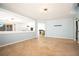 Open-concept living room features tiled floors and bright blue walls at 10902 Pentland Downs St, Las Vegas, NV 89141