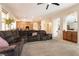 Expansive living room with natural light, neutral décor, and an adjacent dining space, creating a great layout at 1413 Gentle Brook St, North Las Vegas, NV 89084