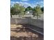 Window view looking into the backyard features a gravel landscaped yard with cinder block perimeter at 1511 Balsam Mist Ave, Las Vegas, NV 89183