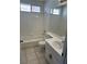 A well-lit bathroom features a bathtub and vanity with ample space and modern fixtures at 1511 Balsam Mist Ave, Las Vegas, NV 89183