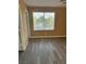Bedroom with flooring, window view of the street at 1511 Balsam Mist Ave, Las Vegas, NV 89183
