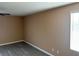 Clean and bright bedroom with hardwood floors, a ceiling fan and plenty of light at 1511 Balsam Mist Ave, Las Vegas, NV 89183