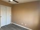Bedroom features hardwood floors, closet, neutral paint and a window at 1511 Balsam Mist Ave, Las Vegas, NV 89183