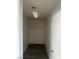 Walk-in closet with shelves and a light fixture at 1511 Balsam Mist Ave, Las Vegas, NV 89183