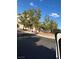 Silverado Ranch community entrance with a brick sign and trees at 1511 Balsam Mist Ave, Las Vegas, NV 89183