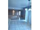 Dining room featuring tile floors, new lights, and modern window covers at 1511 Balsam Mist Ave, Las Vegas, NV 89183