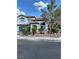 Beautiful two-story home featuring a tile roof, manicured landscaping, and a spacious two-car garage, offering great curb appeal at 1511 Balsam Mist Ave, Las Vegas, NV 89183