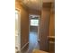 Inviting hallway leads to a bright bedroom and an adjacent bathroom with ample space at 1511 Balsam Mist Ave, Las Vegas, NV 89183