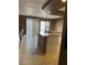 Bright kitchen with granite island, stainless steel sink, and natural lighting at 1511 Balsam Mist Ave, Las Vegas, NV 89183