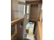 Staircase with clear view of kitchen and a dining area from the upper floor at 1511 Balsam Mist Ave, Las Vegas, NV 89183