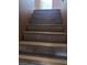 View of the wood-look stairway leading to the upper level at 1511 Balsam Mist Ave, Las Vegas, NV 89183