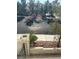 Street view features landscaped yard, large trees, sidewalk and paved road at 1511 Balsam Mist Ave, Las Vegas, NV 89183