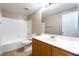 Bathroom featuring a tub-shower combo and a spacious vanity at 2152 Jasper Bluff St # 103, Las Vegas, NV 89117